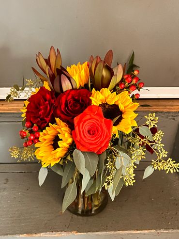 October Wedding: Bouquet Floral Arrangement 
Roses Safari Sunset Sunflowers eucalyptus. Barn Wedding