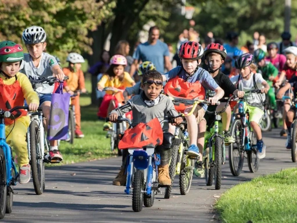 Large Group of Kids Riding with Kings Cycling at a local Public Park in NYC.
