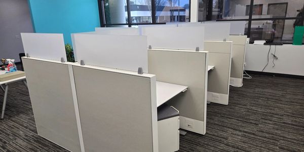 Haworth cubicles, 42x42 with 53 inch panels and 14 inch frosted plexiglass stackers.