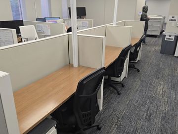 Haworth 60x24 call center cubicles with 50-inch tall panels arranged in a three-pack workstation.