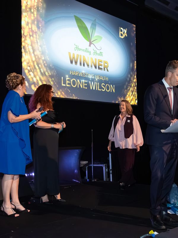 Leone Wilson receiving her international award for Business Excellence in Health & Wellness