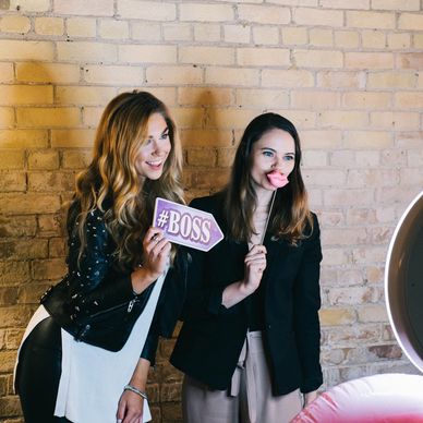 Ladies using toronto photo booth companies social kiosk. touch less photo rental