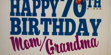 Happy 70th birthday sign for Mom/Grandma with colorful letters.