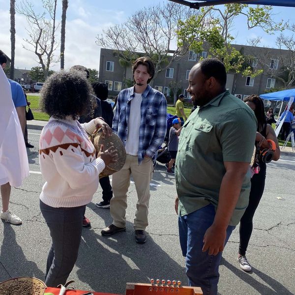 playing the drum with the community, Eritrean, Community, Services, San Diego