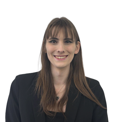 Smiling woman with long brown hair in black blazer.
