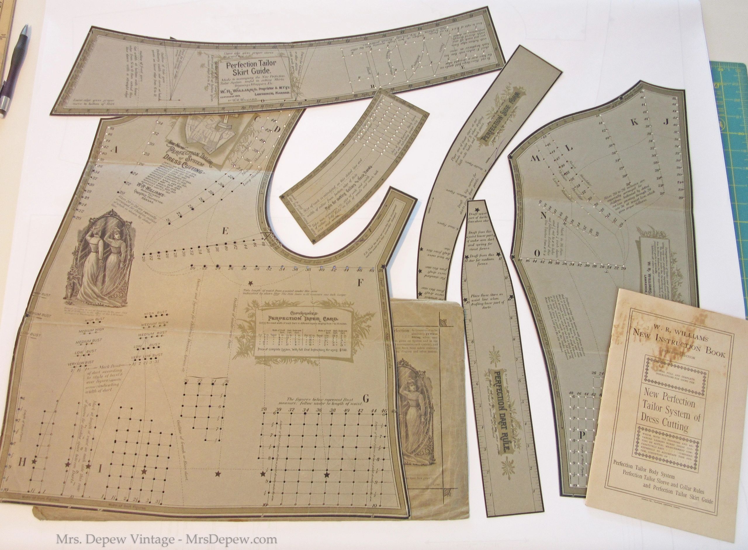 Collection of 13 Dress Making Seamstress & Tailor Rules Ruler Systems -  19th c.