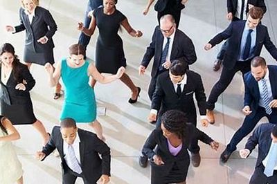 group of employees dancing