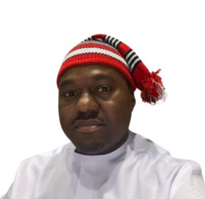 Man wearing traditional red and white hat with white attire.