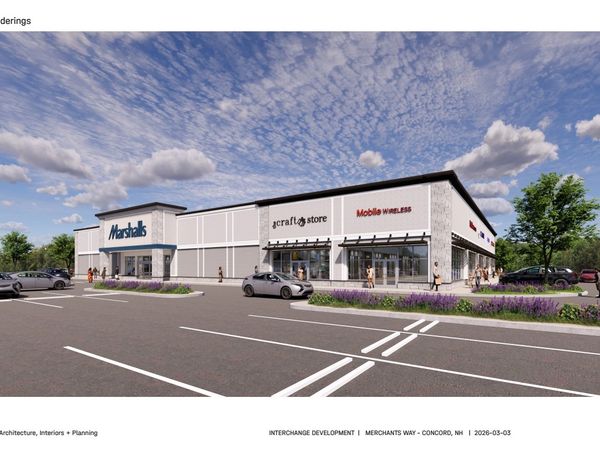 Modern retail strip mall with Marshalls, a craft store, and Mobile Wireless under a partly cloudy sky.