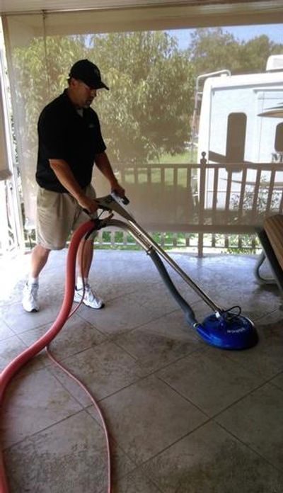 Technician in action using the Hydro-Force cleaning tool
