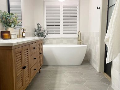 Spa like bathroom with freestanding tub, updated fixtures and full bathroom renovation. 