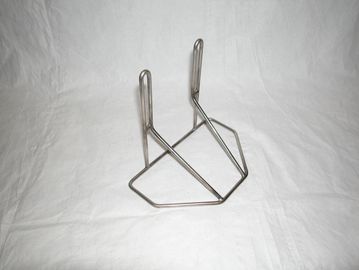 Metal wire stand on a white background.