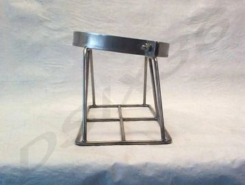 Metal stand with circular top and square base.