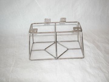 Metal wireframe holder with angled compartments.