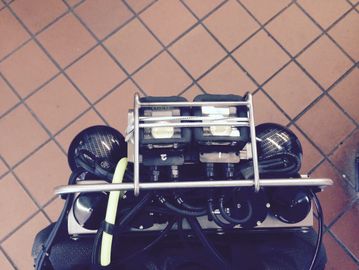 Top view of a motorcycle headlight assembly.