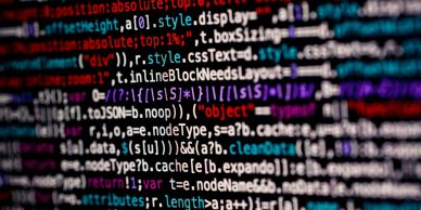 Colorful lines of code on a dark screen.