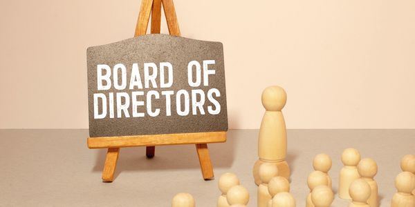 Rendering of wooden stick figures looking at a sign that reads "Board of Directors"