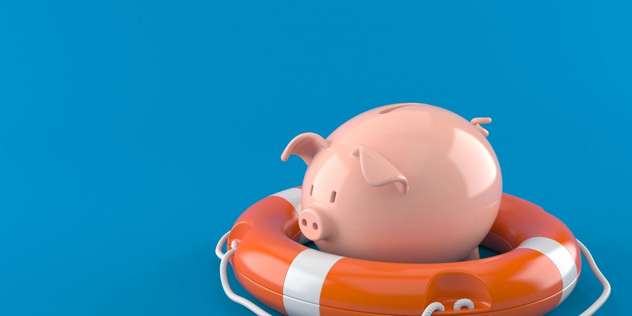 Image of a piggy bank floating in a life saver