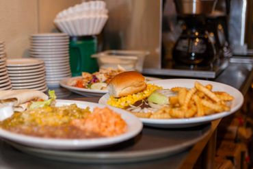 Delicious food served food in plates display of the website