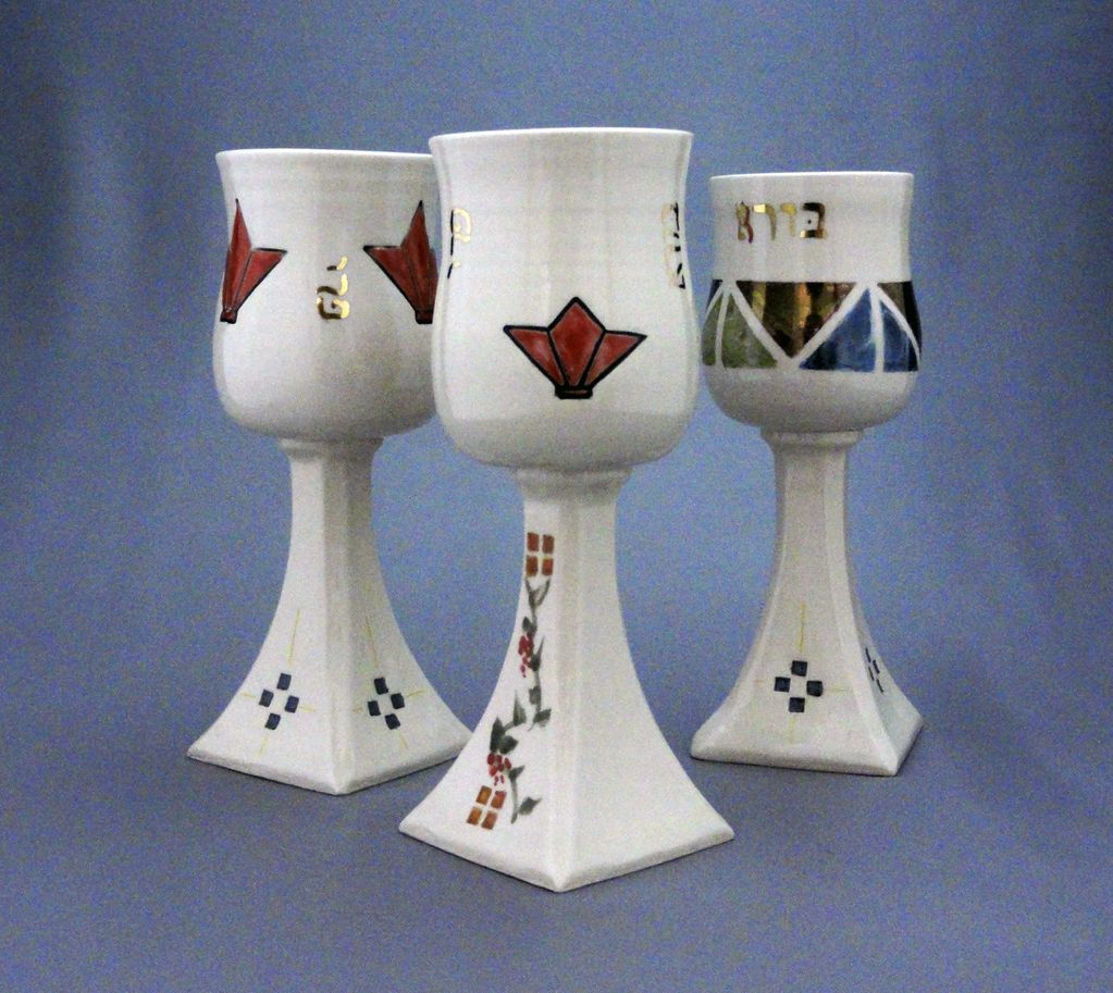 Tall wine kiddush cups. Arts and crafts inspired. Squre base and round cups. Gold accents.