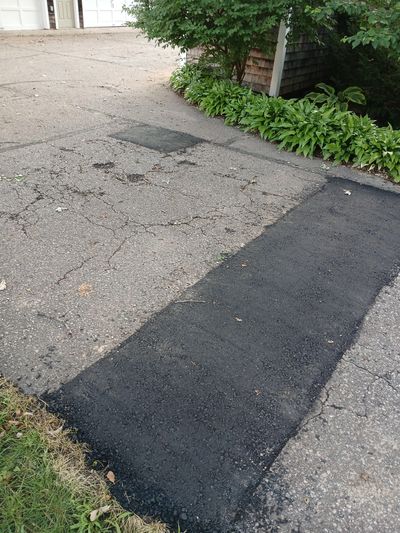 Pothole and asphalt patch repair in Northfield, MN.