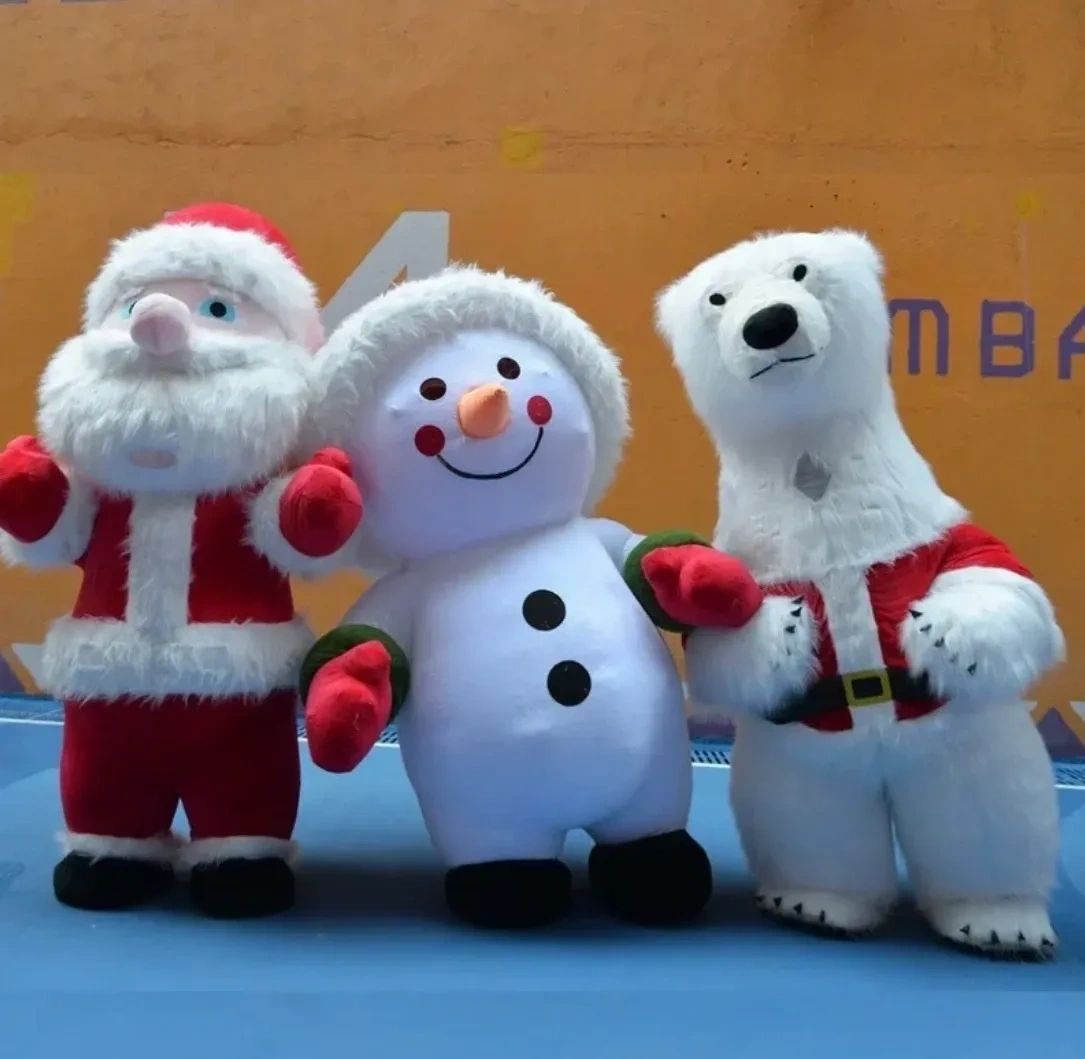 Santa, snowman and polar bear inflatable mascot characters 