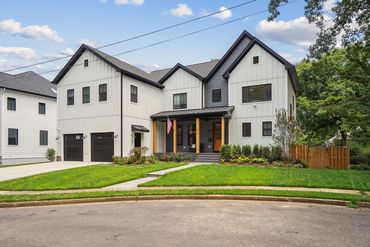 new home with 2 car garage and covered entrance