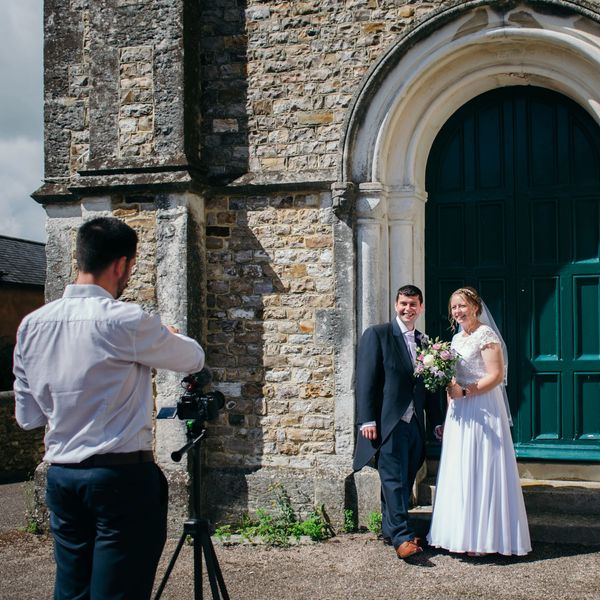 Josh from Smart Captures Wedding Films filming a wedding in Dorset