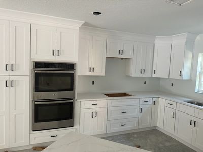 White Shaker cabinets, and Quartz countertops installed In Homosassa Fl.