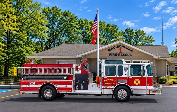 Fire truck parked outside Madisonville Fire-Rescue station.