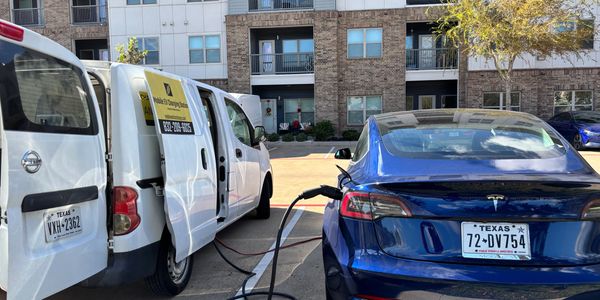 Mobile EV charging station Emergency Mobile electric car charging service. Tesla roadside assistance