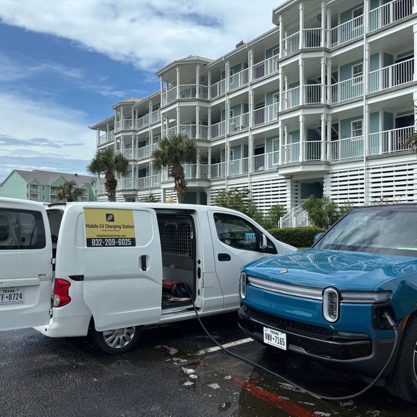 Mobile EV charging service in resort parking lot. Galveston to Oklahoma