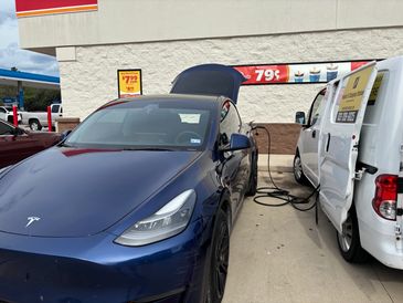 Emergency roadside Mobile EV charging of Tesla Model Y stranded at a convenience store