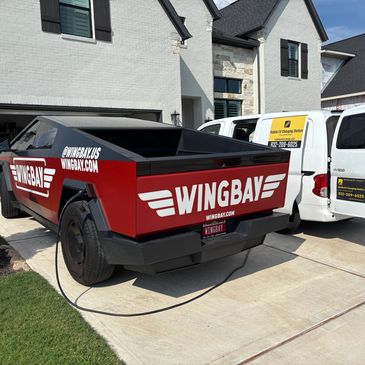 Mobile EV charging station brought to Tesla Cybertruck at a residential area for a stranded EV motor