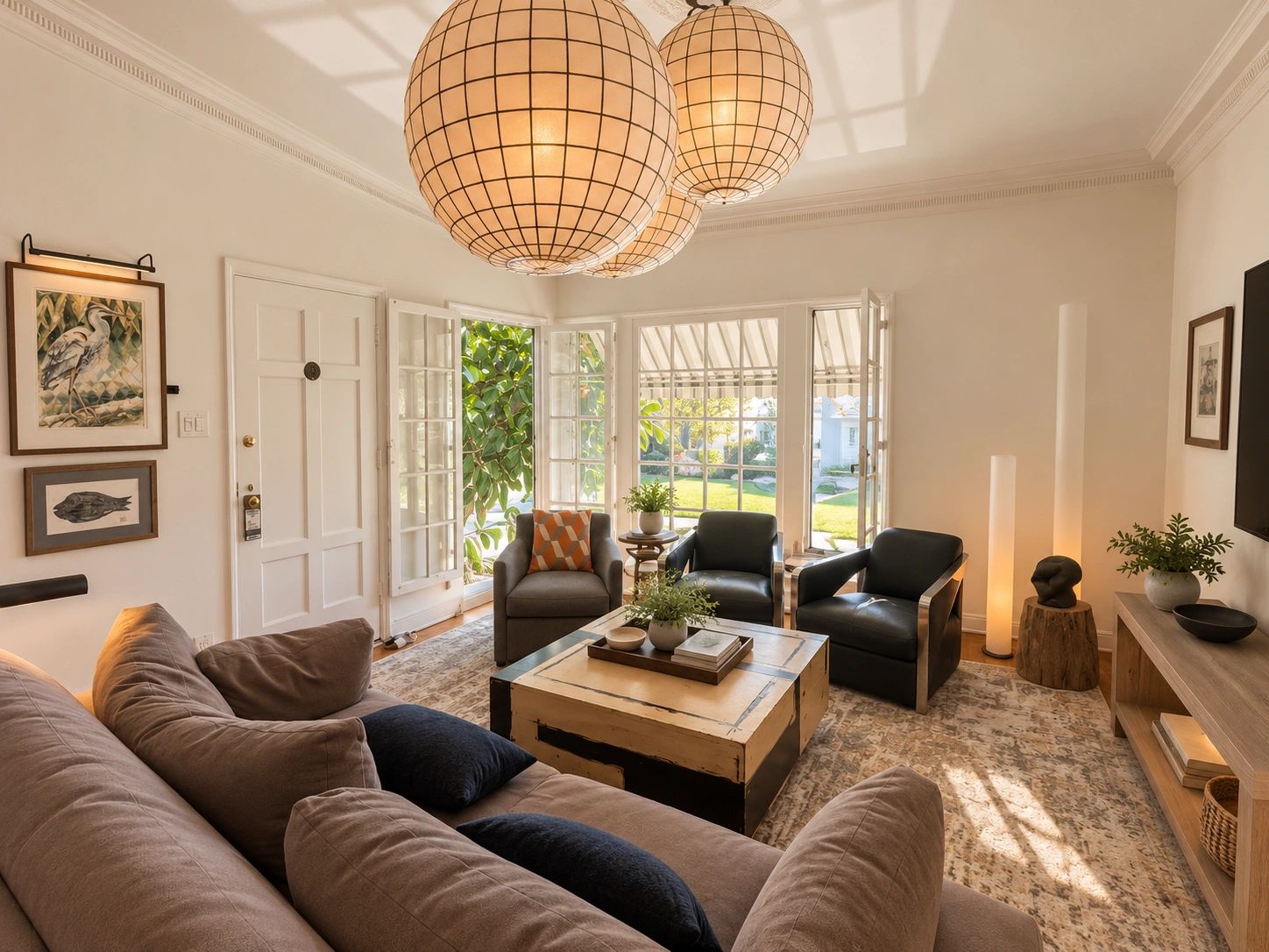Cozy living room with large windows and modern decor.