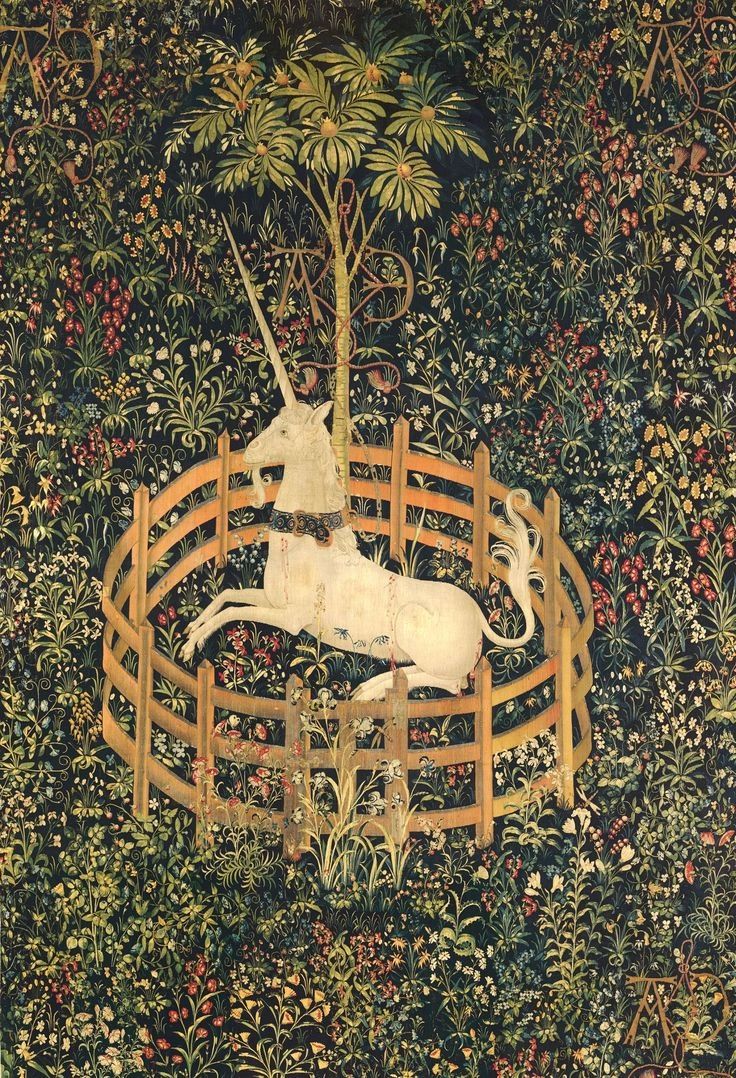 Medieval Tapestry. Unicorn in a raound enclosure.