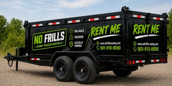 Black dump trailer with bright green and white rental advertisement.