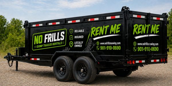 Black dump trailer with bright green rental advertisement on a gravel ground.