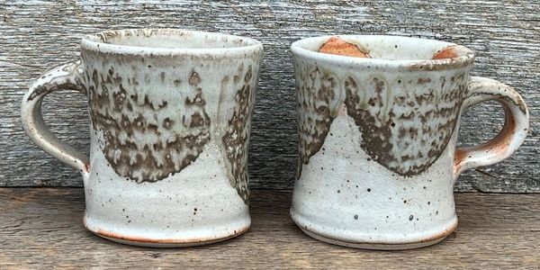 Pair of shino and wood ash mugs