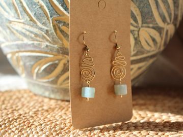 Gold wire wrapped swirl earring with Amazonite stone