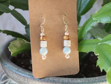 Stacked natural stone dangle earrings with gold swirl