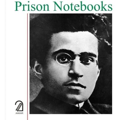Book cover of 'Prison Notebooks' featuring a black-and-white portrait of a man with glasses.