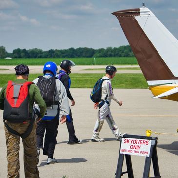 walking to the plane. skydiving near saint Louis Missouri