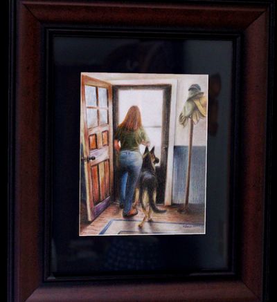 Framed painting of a woman and dog looking out an open door.