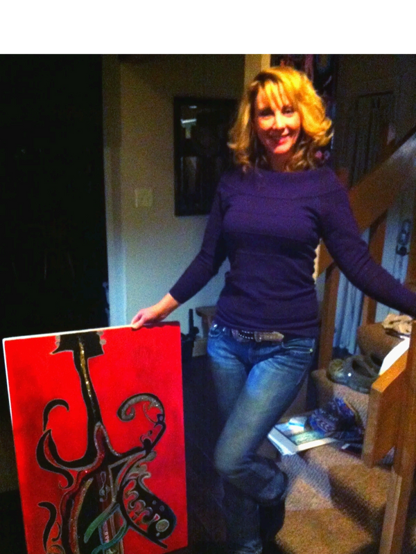 Michelle Showing off one of her new abstract guitar painting.