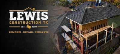 Construction site showing a house under renovation with scaffolding and workers.