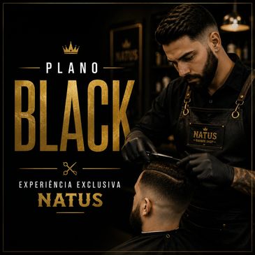 Barber giving a stylish haircut in a premium black-themed salon.