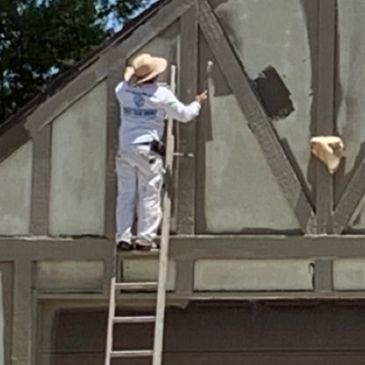 Detailed hand painting on wood trim work 