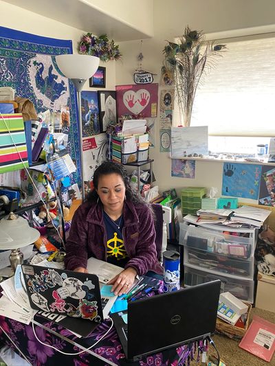 Winter providing virtual tutoring from the home office space. 