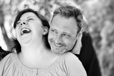 Couple enjoying a joyful moment together.